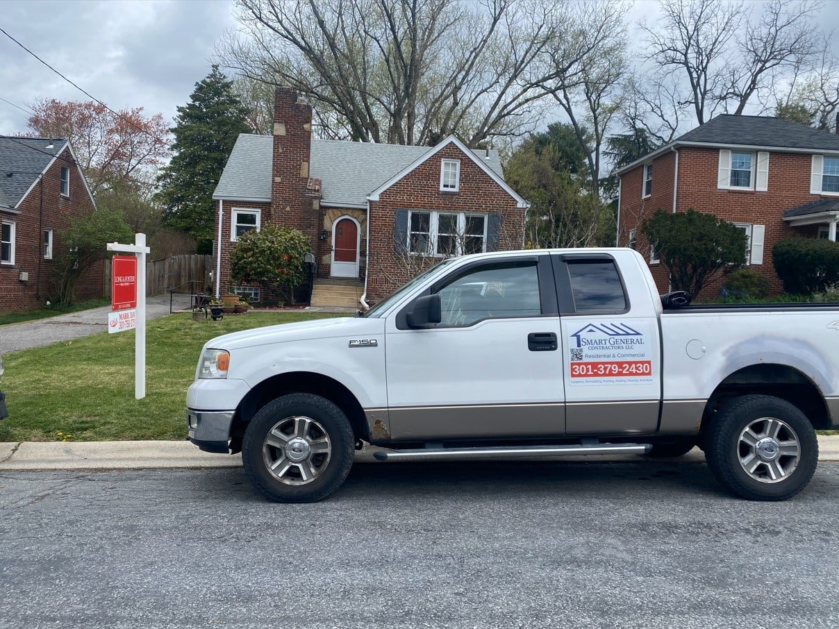 Smart General Contractors company vehicle on-site at residential project